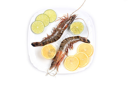 盘子里有生虎虾营养养殖午餐绿色贝类动物健康美食柠檬饮食图片