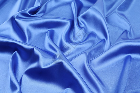 蓝色丝绸背景热情微光寝具墙纸窗帘布料海浪丝带版税曲线图片