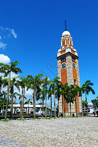香港的时钟塔纪念碑铁路建筑学文化地标时间火车棕榈蓝色车站图片