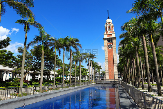 香港的时钟塔棕榈文化时间纪念碑古董天空建筑铁路历史性蓝色图片