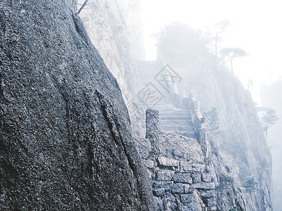 黄山山天气悬崖地标树木风景松树遗产旅游国家顶峰图片