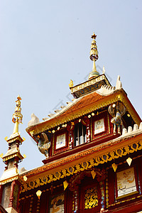 广场Buddha大厅一角镜子棕色奢华金子工作红色艺术竹子装饰品宝石图片