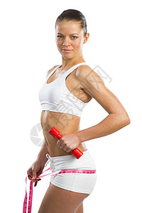 腰部的年轻运动女性内衣健身房训练燃烧腹部重量营养女孩身体测量图片