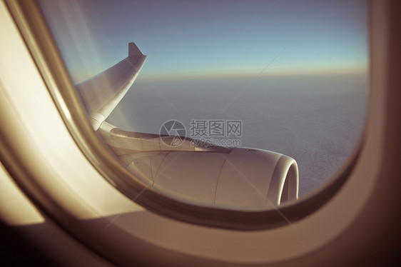 从飞机窗口查看鸟瞰图窗户日出旅行引擎商务图片