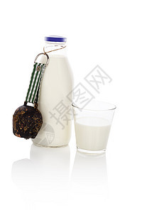 饮用牛奶养分乳白色饮料奶油牛铃古董食物早餐奶制品液体图片