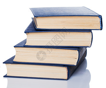书籍 白色背景的旧书堆叠桌子教科书头书学习阅读历史木头学校蓝色教育图片