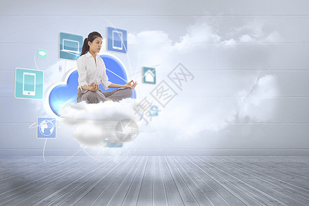 商业女商务人士坐在莲花的姿势上职业技术女性平板投影天空马尾辫手机药片电脑图片