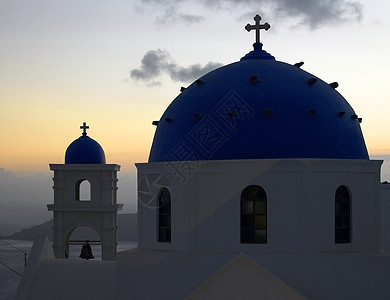 希腊圣托里尼岛教会圆顶旅行火山旅游日落图片