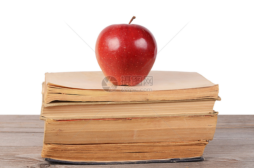 白纸上孤立苹果的书商业大学科学知识收藏叶子红色学习文学图书馆图片