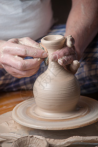 陶匠的手杯子手工手工业女士花瓶制品陶器陶瓷工作血管图片