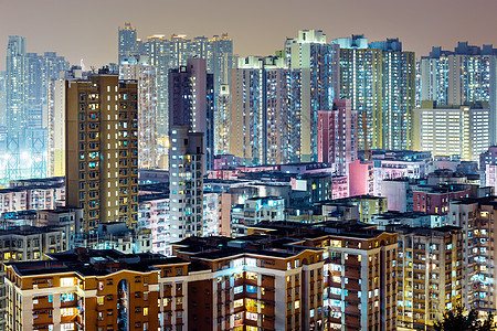 晚上在香港的公寓高楼基础设施天空房子地面住宅建筑学城市建筑红色图片