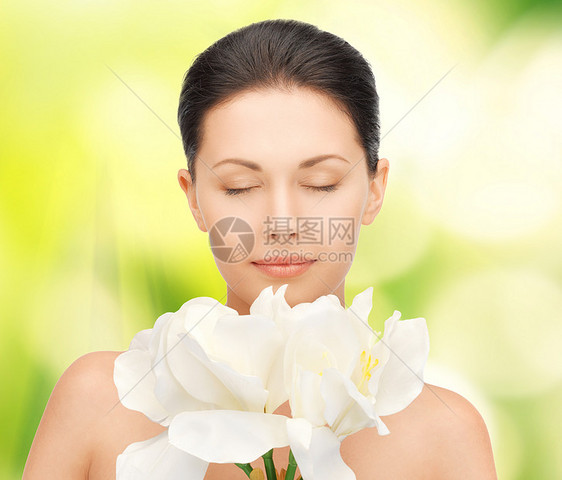 有兰花花的美女护理福利植物卫生保健皮肤活力女孩容貌青年图片