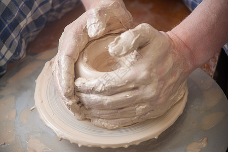 陶匠的手手指陶器拇指艺术制造业工艺作坊制品血管旋转图片