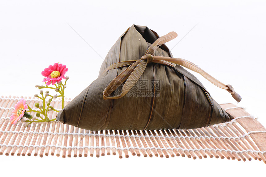 龙船节的中国宗子小吃粽子庆典丝带饺子猪肉细绳水平叶子棕色图片