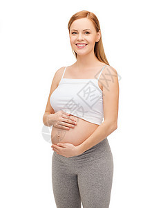 未来幸福的母亲抚摸她的肚子孩子父母女士女孩怀孕婴儿微笑男生家庭女性图片