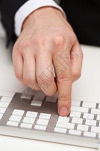 与键盘合作的商务人士金融电脑会计技术职场人士老板教育报告营销图片