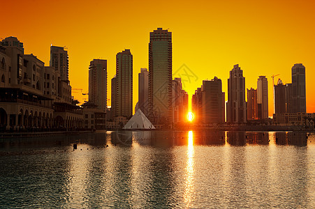 迪拜日落日出太阳天际反射海湾建筑学旅游城市射线奢华图片