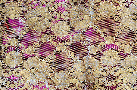金色的金带织物粉色金子材料奢华花朵纺织品丝绸背景图片