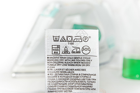 洗衣护理符号熨烫打扫衣服警告材料宏观洗涤洗衣店纺织品数据图片