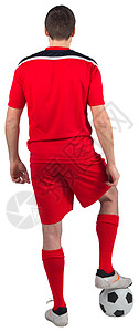 身着红装的足球运动员与球站在一起活动男人男性运动运动服齿轮红色播放器图片