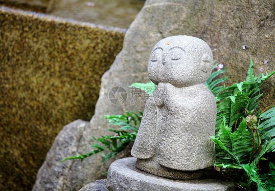 佛像艺术雕塑寺庙祷告崇拜植物宗教沉思岩石雕像图片