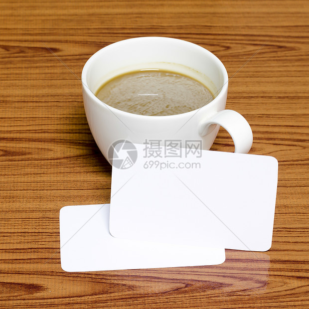 咖啡杯和名片陈列柜桌子身份嘲笑卡片咖啡公文包收藏打印品牌图片