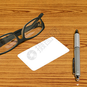 带眼镜的大忙车卡和笔木头键盘食物补给品卡片身份杯子推介会品牌咖啡图片