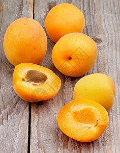 杏子食物乡村水果灰色水果石素食养分背景棕色黄色图片
