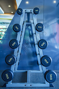 体重重量哑铃生活方式器材健身房健身运动金属举重健康训练背景图片