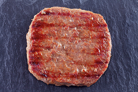 汉堡包黑色网格烹饪炙烤烧烤馅饼营养食物牛肉石头图片