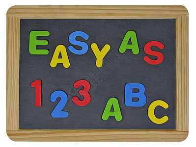 字母e简单到123本ABC写在儿童学校的表格上背景