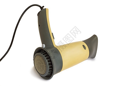 在白色背景上烘干头发的吹风机装置电机按钮造型师电子工具隔离设备塑料高温图片