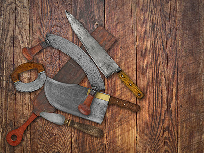 古老的厨房用刀对旧木头的拼贴桌子古董项目家庭乐器用具配饰皮革收藏品美食图片