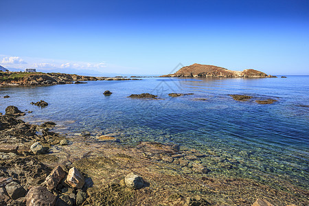 海旅行日光绿色头巾石头蓝色山脉场景天空海景图片