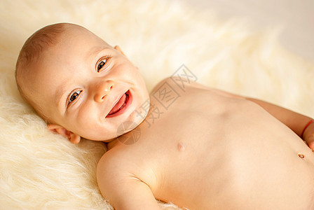 男婴婴儿新生微笑孩子眼睛幸福童年男性男生喜悦生活美丽的高清图片素材