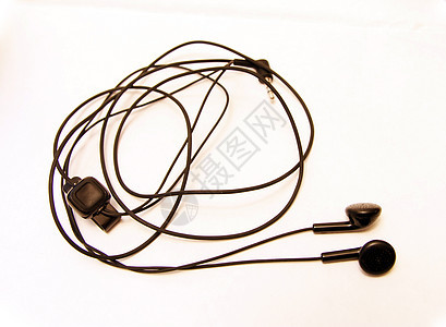 在白色背景上被孤立的黑耳机立体声体积讲话音乐收音机歌曲音乐播放器耳朵技术电话图片