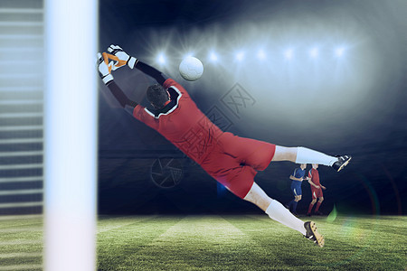 红色跳跃中的守门员综合图像聚光灯运动员团队世界白色绿色杯子齿轮闲暇活动图片