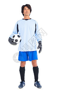 蓝持球靶员运动服男性专注运动闲暇男人足球活动世界杯子图片
