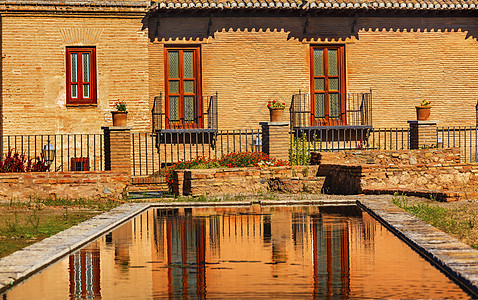 抽象西班牙纪念碑墙壁历史性建筑水池建筑物文化建筑学庭院反射图片