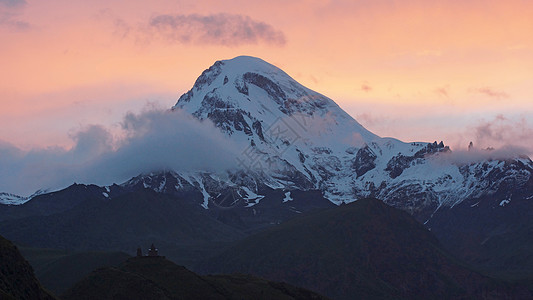 格鲁吉亚 欧洲和格鲁吉亚的卡兹贝克山全景风景日落旅游山脉顶峰首脑图片