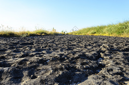 狂野西部公路砂岩天气风景蓝色纪念碑岩石天空地平线沙漠旅游图片