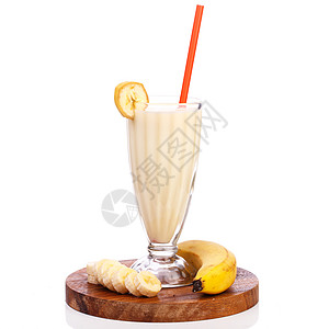 美味的香蕉奶昔木板饮食茶点水果果汁牛奶玻璃管子桌子甜点图片