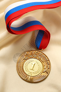 金属奖牌第一名褐色纺织品圆形折叠耳朵蓝色皱纹徽章丝绸胜利图片