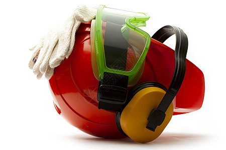 带耳机 护目镜和手套的红色安全头盔工作服帽子建造黄色工业头饰塑料安全帽衣服白色图片