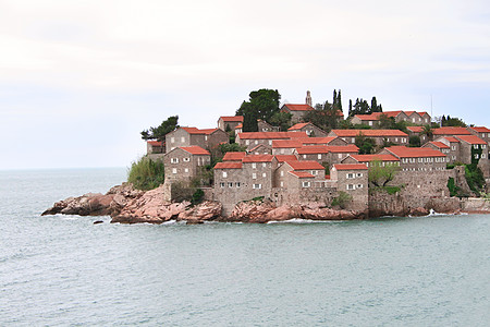 黑山度假岛堡垒奢华天空蓝色海滩石头村庄建筑支撑酒店图片
