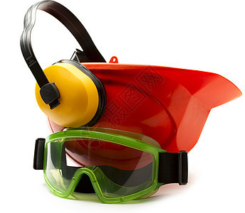带耳机和护目镜的红色安全头盔眼睛安全帽眼镜捍卫者工业塑料工作头饰衣服建造图片