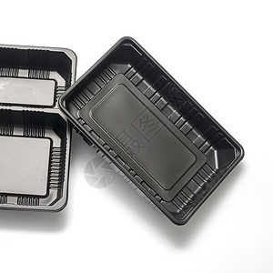 黑色塑料黑塑料容器集装箱盒子长方形回收贮存包装垃圾白色食物环境背景图片