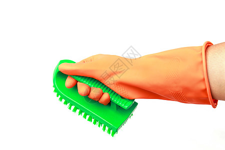 手戴在白色背景上孤立的橙色塑料手套工具洗手间家务绿色橡皮刷子工业擦洗产品橙子图片