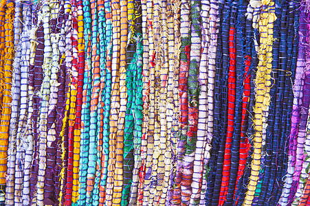 色彩多彩的地毯绳索检查紫色工艺纺织品钩针色调针织紫丁香细绳图片