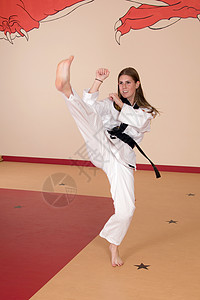 武术女健康白色健身房跆拳道空手道防御女孩罢工女士背景图片